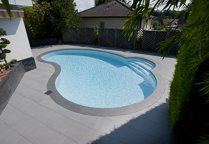 creation of STONE GGILPRO natural stone swimming pool terrace in Ghent, lodelinsart, Lommel and jumet