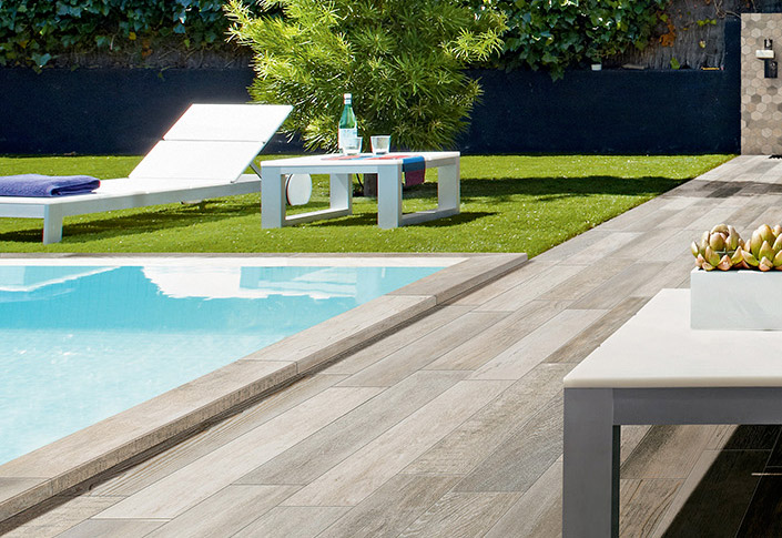 terrace layout for your pool with tiles imitation wood ggil pro in charleroi louvain la neuve, wavre and  mons